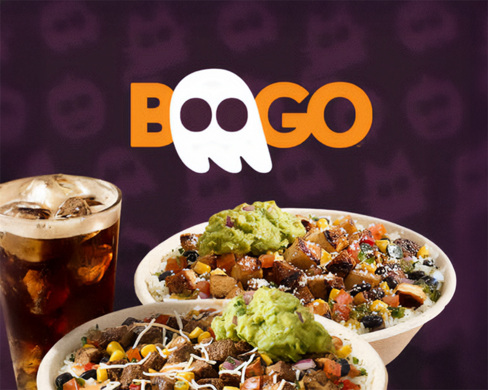 QDOBA BOOGO Halloween promotion featuring two burrito bowls topped with guacamole, corn salsa, and grilled proteins next to a cold drink, with the word BOOGO and a ghost icon in the background.
