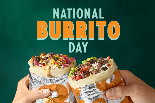 Two hands holding QDOBA burritos filled with steak, queso, guacamole, and fresh toppings under “National Burrito Day” text promoting a BOGO offer.
